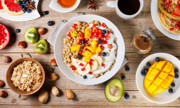 istock bowl of cereal with fruit and yogurt 2187247156