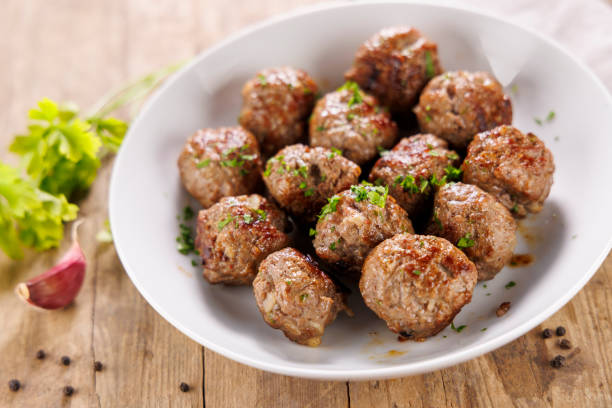 istock grilled roasted meatballs with herbs and spices 2187247470