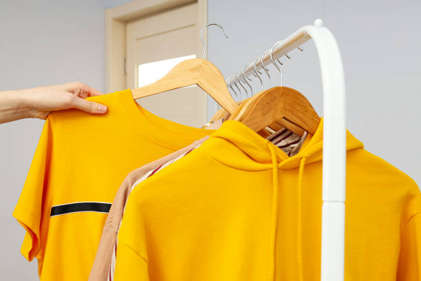 istock Wardrobe rack with different clothes, concept of different clothes 2187249511