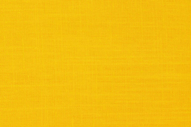 istock Yellow linen fabric cloth texture background, seamless pattern of natural textile. 2187250501