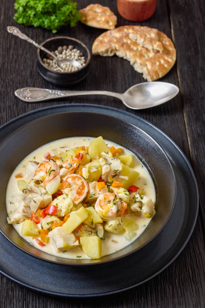 istock seafood chowder in a white bowl, top view 2187252343