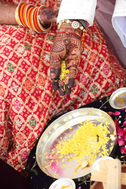istock Offering prayers to the holy fire during a Hindu wedding ceremony. 2187252346