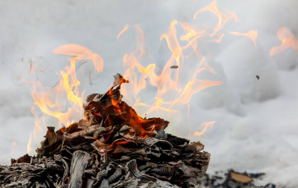 istock A pile of burnt paper with a fire on top 2187253940