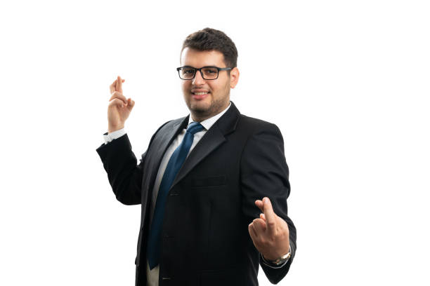 istock Cheerful male entrepreneur making double good luck gesture 2187261660