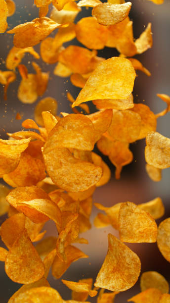 istock Freeze motion of flying fried potatoes chips 2187264457
