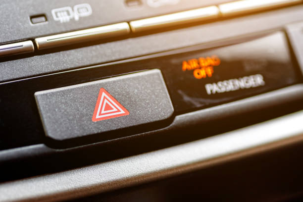 istock Inside the car.Emergency stop button in car.Dashboard, inner workings of a car. 2187267364