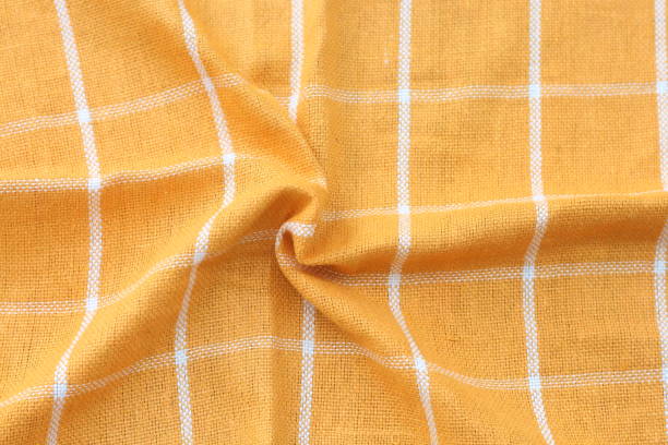 istock wrinkled classic yellow plaid fabric 2187269679