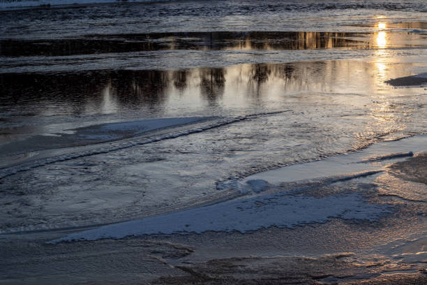 istock Kiiminkijoki river freezing over in Haukipudas, Oulu Finland 2187270022