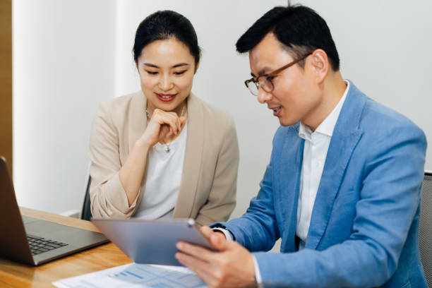 istock Asian business partners in meeting. 2187271246