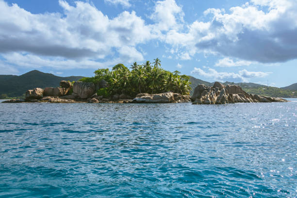 Bizarre Granite Boulders And Some Palms At The Small Island St. Pierre, Seychelles