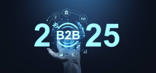 istock 2025 B2B Business Strategy Concept with Futuristic Elements in Hand on Dark Background. 2187277685