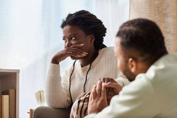 istock Enjoying cozy moments together in winter sweaters at home during a cold evening 2187278983
