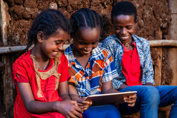 istock African children using digital tablet, East Africa 2187281932