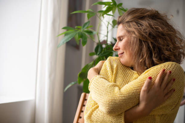 istock Tranquil scene of woman at home 2187283664