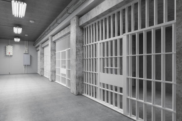 istock Close-up Of Prison Cells And Empty Corridor 2187283755