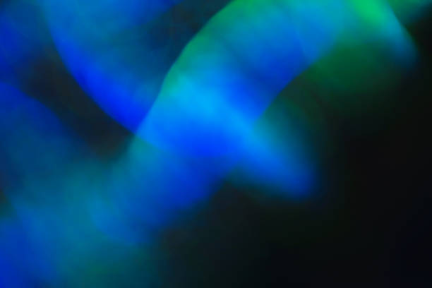 Abstract background made of bright green and blue blurred texture. Colorful light effect.