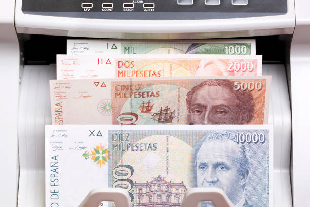 istock Spanish peseta in the counting machine 2187286333
