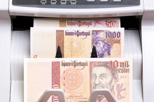 istock Portuguese escudo in the counting machine 2187286352