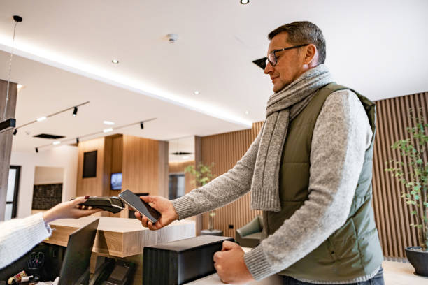 istock Mobile payments at reception in luxury hotel 2187286489