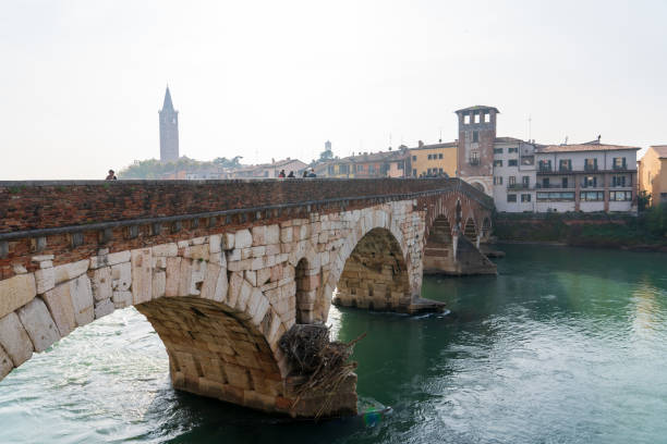 Verona, Italy - November 8, 2024: Cityscape. Bridge over the river, view of the old town.