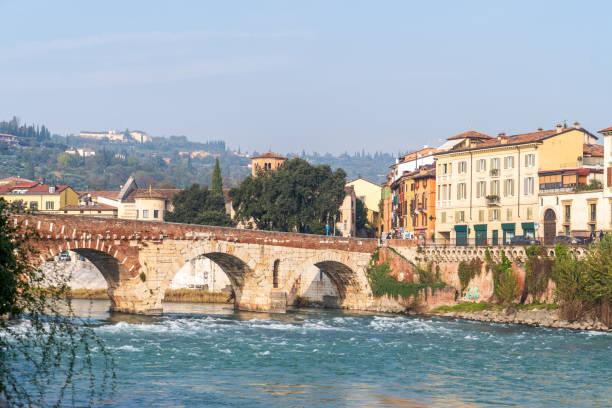 Verona, Italy - November 8, 2024: Cityscape. Bridge over the river, view of the old town.