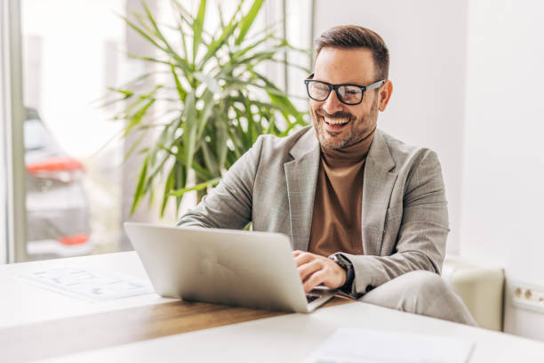 istock A businessman is working on a laptop in a modern office 2187294655