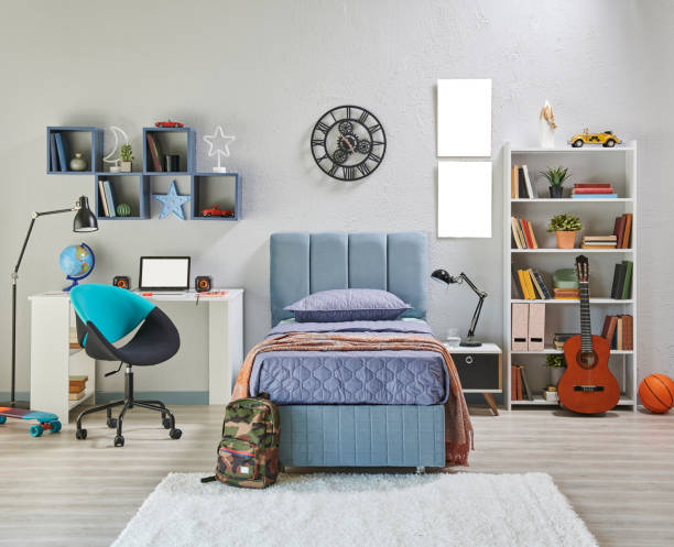 istock Teenage bedroom interior concept with bookshelf, lamp, table, book and notebook, frame, guitar, bedding set and home accessory style, architecture decoration. 2187302242