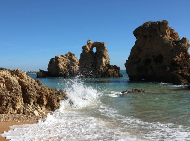 istock Scenic ocean view with rocky cliffs and waves. 2187303743