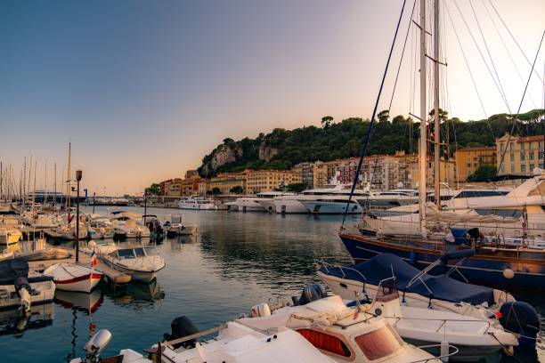 istock Nice harbor sunset with yachts and buildings 2187304594