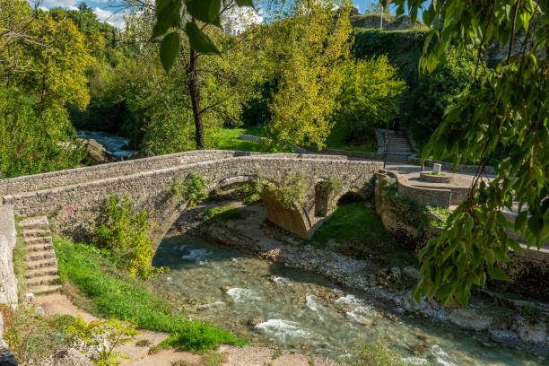 Old ribnica river bridge, Podgorica, Montenegro The bridge was created in the area around the confluence of river Ribnica to river Morača, during the reign of the Romans in this area podgorica stock pictures, royalty-free photos & images