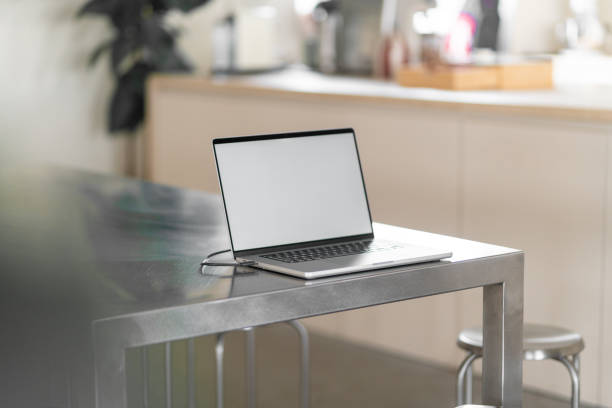 istock There is a laptop with a white screen on the table. 2187306950