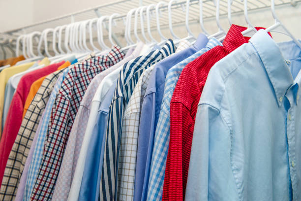 istock men's shirts hanging on a hanger 2187308850