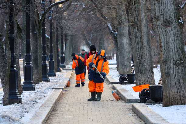 Moscow, Russia - November 25, 2024: Janitors cleaning the Tverskoy boulevard in Moscow