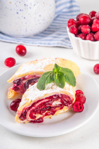 Cranberry strudel, winter roll dessert with cranberry jam