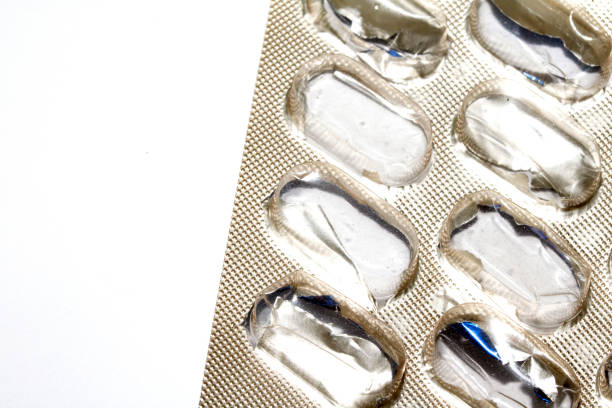 istock Open Used Broken Foil Pill Popping Tablet Dispenser Blister Packet Close Up 2187313274
