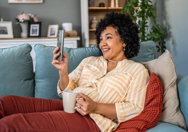 istock Mature woman relaxing at home 2187331653
