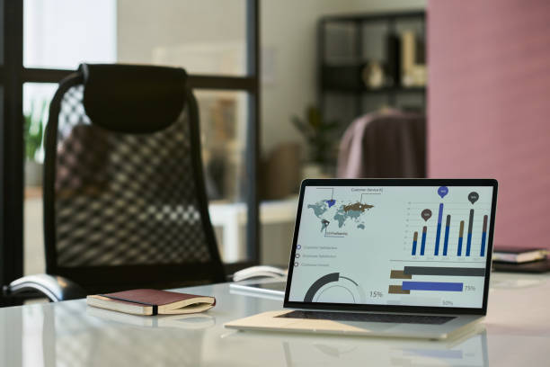 istock Charts and diagram on screen of laptop 2187332113