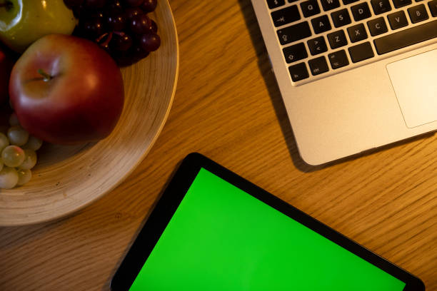 home kitchen empty screen mockup laptop tablet equipment smart home system coffee maker green plants lifestyle real estate interior stairs tomatos lemon fruits