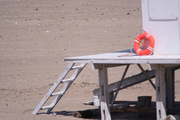 Lifeguard stand on the beach , near the seashore