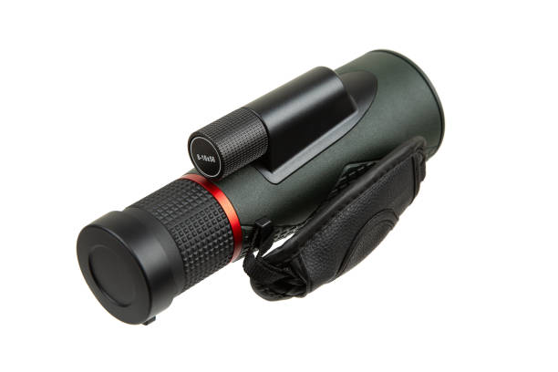 istock High-quality thermal imaging monocular with a textured grip, lens cap, and ergonomic design, ideal for outdoor activities and wildlife observation. 2187335988