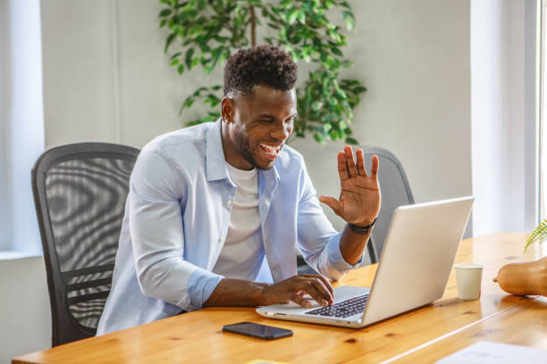 istock A man engaged in a video call at his office workspace during the daytime 2187337684