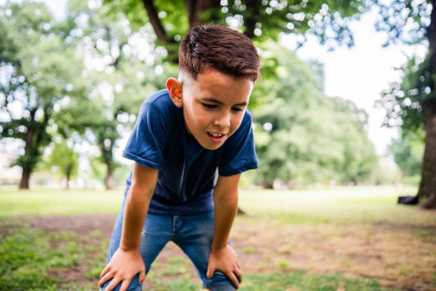 istock Tired boy on the public park 2187338942