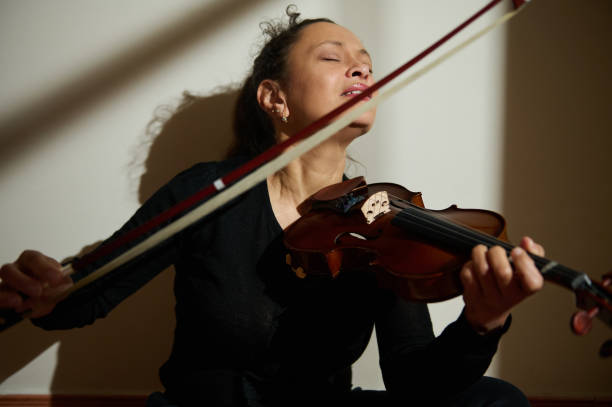 istock Passionate violinist playing with emotion and intensity 2187348507