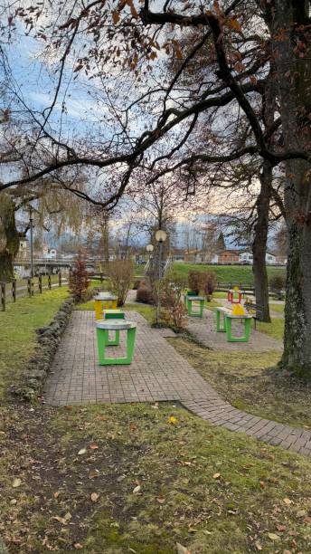 istock Quiet Autumn Day in a Tranquil Park With Colorful mini golf tables 2187350418