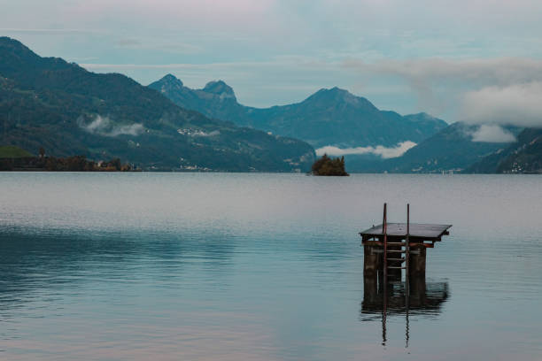 istock wooden pier in the lake 2187355812