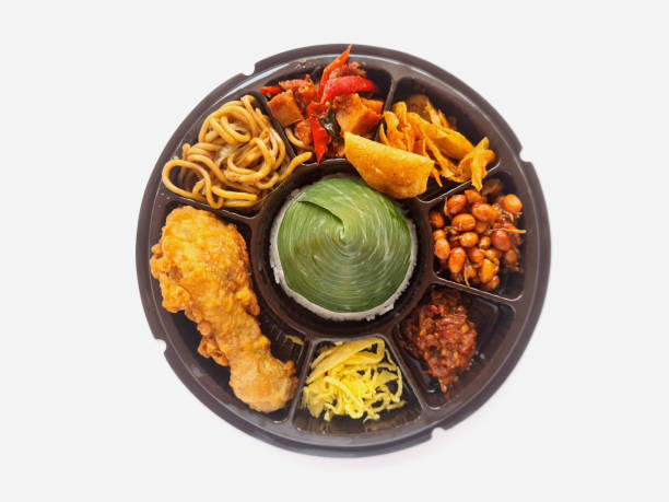 istock Cone shaped rice or Tumpeng mini with fried chicken and other side dish, served as festive and traditional dish of Indonesia in any ocassion. 2187366507