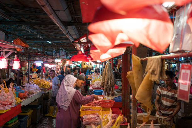 Kuala Lumpur, Malaysia - Oct 5th, 2024: Morning activity in the meat section of Chow Kit wet market in Kuala Lumpur, Malaysia.