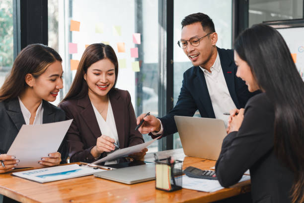 istock Efficient business meeting with professionals discussing strategies and ideas. team collaborates actively, showcasing teamwork and engagement in modern office setting 2187367022