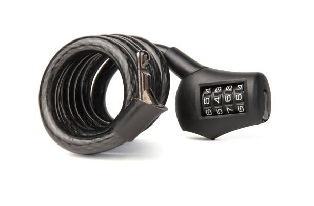 New outdoor cable bicycle combination lock isolated on white background. Close-up
