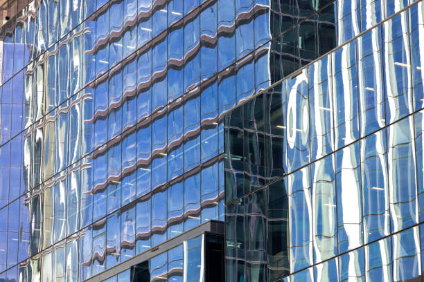 istock Closeup modern office building with reflection, skyscraper, abstract background with copy space 2187369126